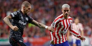 Bayer Leverkusen and Atletico Madrid players vie for the ball during a Champions League match on October 26, 2022 in Spain.