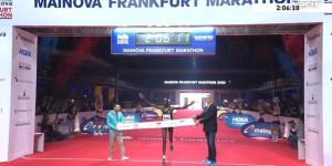 Kenya's Brimin Kipkorir Misoi celebrates winning the 2022 Frankfurt Marathon title on October 30, in Germany.