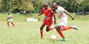 Wesley Mukhwana (L) of Bukembe vies for the ball with Ebwali's Emmanuel Kipyego (R) on September 3, 2022 at Mumias Sports Complex.