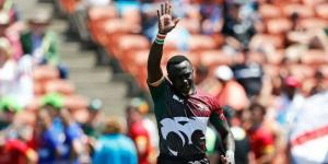 Former Shujaa player Collins Injera waves to the fans during a past international match.