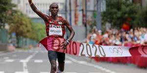 World record holder Eliud Kipchoge celebrates winning the Tokyo Olympic title on August 8, 2021, in Sapporo, Japan.