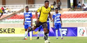 Tusker FC forward Eric Mmata takes a penalty as AFC Leopards players watch on December 4, 2022 at the Kasarani Stadium. 