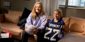From left to right: Chelsea star Erin Cuthbert poses for a photo with Alexis (R).