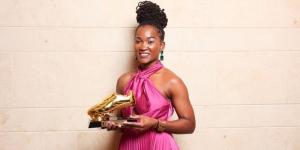 AC PAOK forward Esse Mbeyu Akida poses for a photo with her Golden Boot trophy in Greece on December 12, 2022