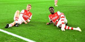 Arsenal's Emile Smith Rowe(left) and Bukayo Saka(right) celebrate their win against West Ham on December 15