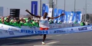 Kenyan athlete Rogers Kwemoi celebrates after winning the men's half marathon held in Istanbul, Turkey on Sunday, March 27.