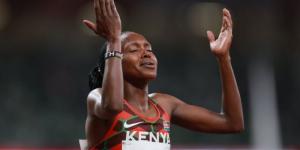 Faith Kipyegon celebrates winning a medal for Kenya at the delayed 2020 Tokyo Olympic Games in Japan.