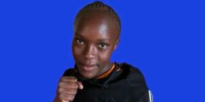 National heavyweight champion Faith Nafuna poses for photo.