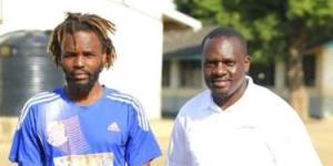 Former Harambee Stars defender Abdalla Juma (L) posing for a photo alongside The Buzz Kenya host Mosh Junior (R).