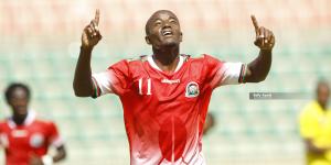 Eric Kapaito celebrates after scoring against Tanzania