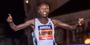 Kenyan runner Geoffrey Koech celebrates winning the 2019 Prague 10km title.