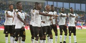 Ghana national team players celebrate a goal in a past African Cup of Nations tournament.
