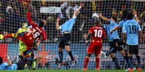 Ghana and Uruguay players in action during a 2010 FIFA World Cup quarterfinal match staged on July 2 in South Africa.