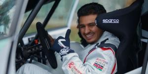 Kenyan racing driver Hamza Anwar poses for a photo inside his car in a past rally event. 