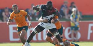 Herman Humwa battling it out with Australian players at the Dubai 7s 2021.