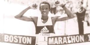 Ex-Kenyan athlete Ibrahim Kipkemboi Hussein celebrates winning a past Boston Marathon edition.