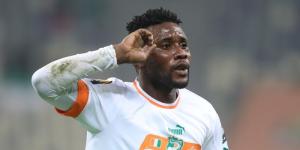 Ivory Coast player Kramo Aubin celebrates scoring a goal against Uganda at the 2023 CHAN tournament on January 22 at the Nelson Mandela Stadium in Algeria.
