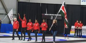The Kenya women's curling team applaud fans in Calgary, Canada during the 2022 Pan Continental Curling Championship on November 5. 