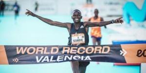Kenya's Kibiwott Kandie celebrates breaking the world record at the 2022 Valencia Half Marathon edition.