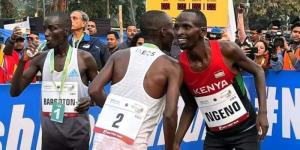 From left to right: Leonard Barsoton, Victor Kiplanagat, and Alfred Ngeno congratulate each other during the 2022 Kolkata road race held in India on December 18.