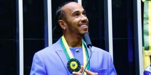 British racing driver Lewis Hamilton addresses a gathering after being awarded Honorary Citizenship by the Brazilian government on November 8, 2022 in Brasilia. 