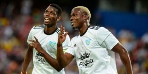 Paul Pogba (R) celebrating a goal with his brother Mathias Pogba in a friendly match in 2017. 