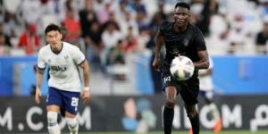 Al Duhail forward Michael Olunga vies for the ball against a Urawa Red Diamonds player on February 26, 2023, in an Asian Champions League match staged at the Al Thumama Stadium in Qatar. 