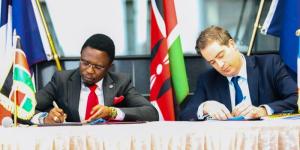 From left to right: Sports CS Ababu Namwamba and the French minister for foreign trade, economic attractiveness and nationals abroad Olivier Becht signing a cooperation deal in Nairobi on February 21, 2023. 
