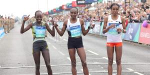 Peres Jepchirchir (L), Hellen Obiri (M) and Almaz Ayana (R) posing for a photo at the 2022 Great North Run on September 11 in Newcastle, United Kingdom.