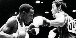 From left to right: Decorated boxer Philip Waruinge in action against his opponent in a past event.