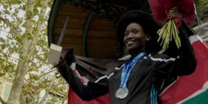 Rebecca Sirwanei Tanui poses for a photo with the Kenyan flag after breaking the San Sebastian Marathon course record on November 27, 2022 in Zurich, Switzerland.