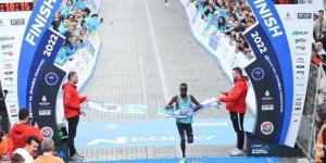 Kenya's Robert Kipkemboi crosses the finishing line at the 2022 N Kolay Istanbul Marathon on November 6, 2022. 
