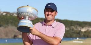 Scottie  Scheffler Showcasing His Trophy After Becoming World Number One Golfer