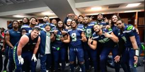 Seattle Seahawks players celebrate their win against Los Angeles Rams on Sunday, January 8, 2022, in the United States.