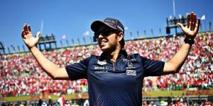 RedBull Formula 1 driver Sergio Perez celebrating his first podium win in Mexico on November 7