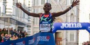 Ethiopia's Tesema Bayisa Atsede celebrates winning the 2022 Florence Marathon on November 27, 2022 in Italy.
