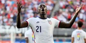 Timothy Weah celebrates scoring a goal for the United States in a past international match.