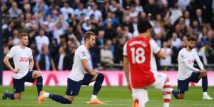 Tottenham Hotspur and Arsenal players taking the knee in a past Premier League match.