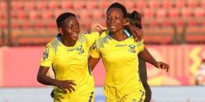 Vihiga Queens players Violet Wanyonyi (right) and Shikangwa Gentrix (left) celebrating a goal in a past match