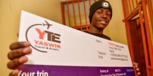 Godson Chagema with his ticket to Manchester for the goalkeeper trials