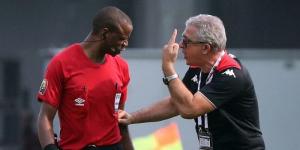 Referee Janny SikazweTunisia(left) arguing with Tunisia coach Mondher Kebaier on January 12.