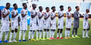 Ghana players singing their national anthem before a match.