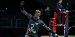 Malkia Strikers player Veronica Adhiambo celebrating scoring a point against Cameroon on September 27, 2022 in Netherlands.
