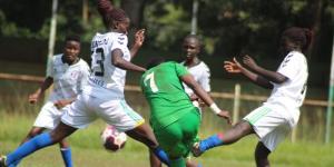 Vihiga Queens and Kangemi Ladies players vie for the ball during a Kenya Women's Premier League match staged at Mumias Complex on December 21, 2022.