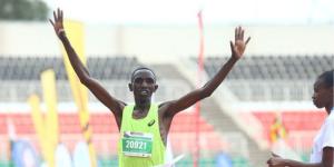 Vincent Ng'etich celebrates winning the 2022 Nairobi City Marathon on May 8, 2022 at the Nyayo National Stadium.