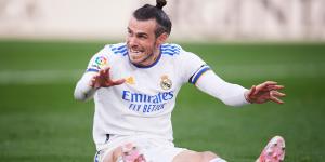 Outgoing Real Madrid winger Gareth Bale cheers on in the 2022 Champions League final.