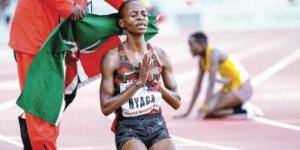  New African Athletics Champion Caroline Nyaga,celebrates after winning the 10,000 metres category held in Mauritius on Saturday, June 11. 