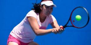 China's Peng Shuai plays a shot during a practice session ahead of the 2015 Australian Open tennis tournament in Melbourne on January 17, 2015.
