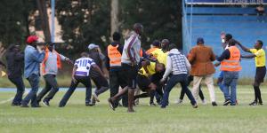 Fans attacking a referee