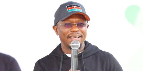 Youth affairs, Sports and Arts CS Ababu Namwamba speaks during the 2022 Standard Chartered marathon award ceremony on October 30, 2022 in Nairobi.